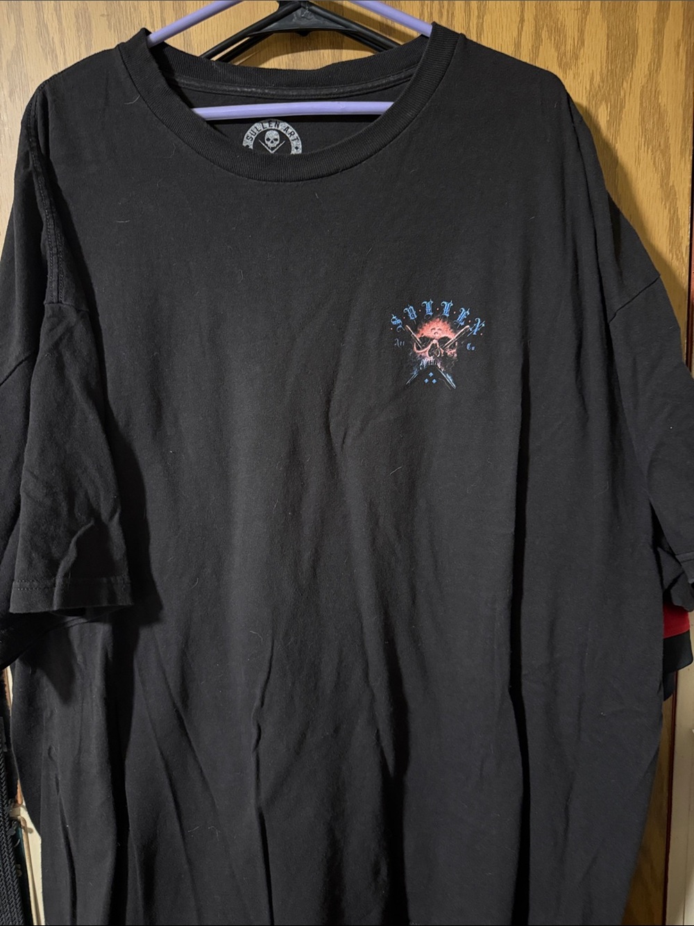 Black Graphic Short Sleeve Men’s Tee with Small Chest Emblem